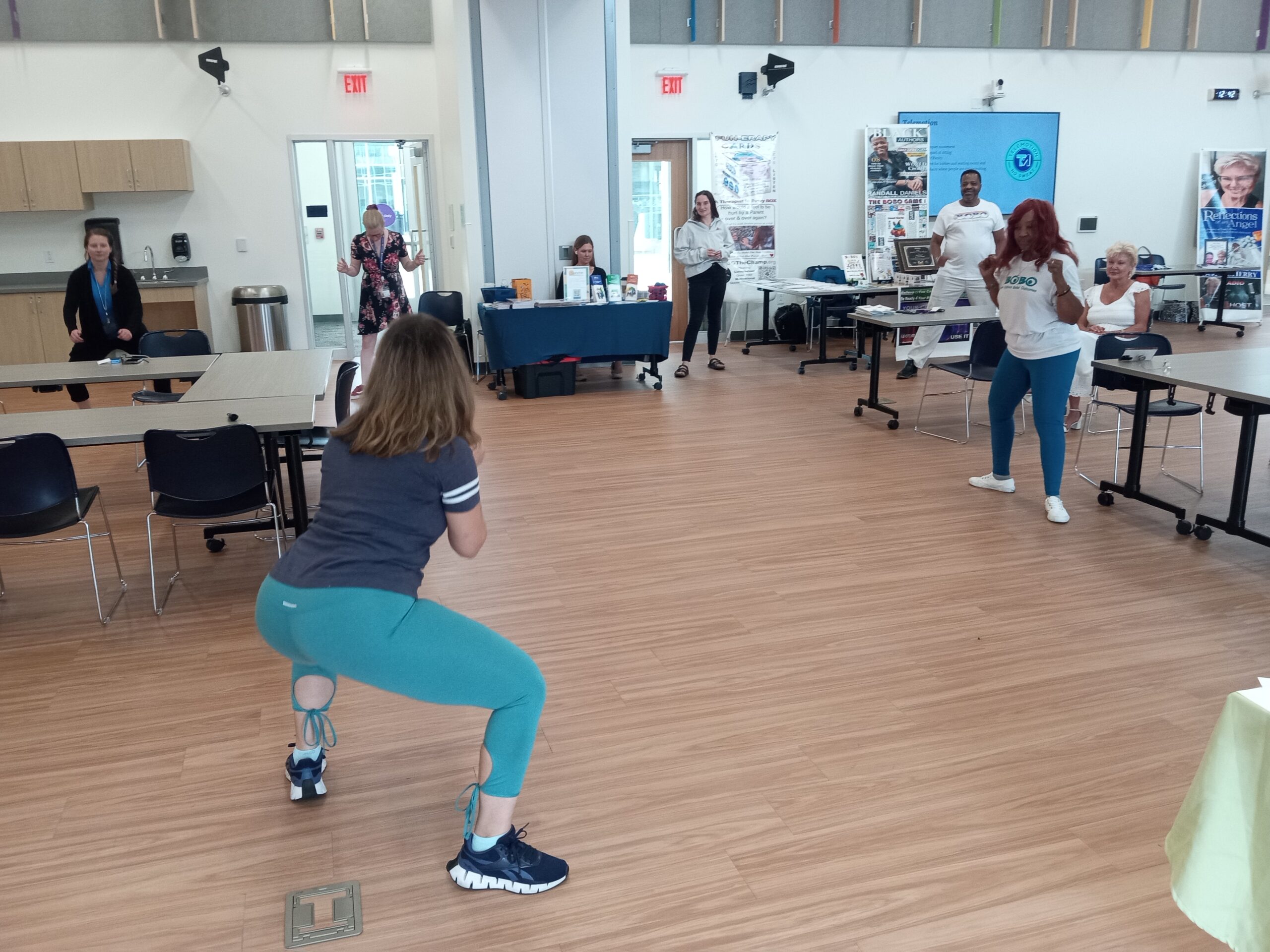 Teresa demonstrating a seated movement