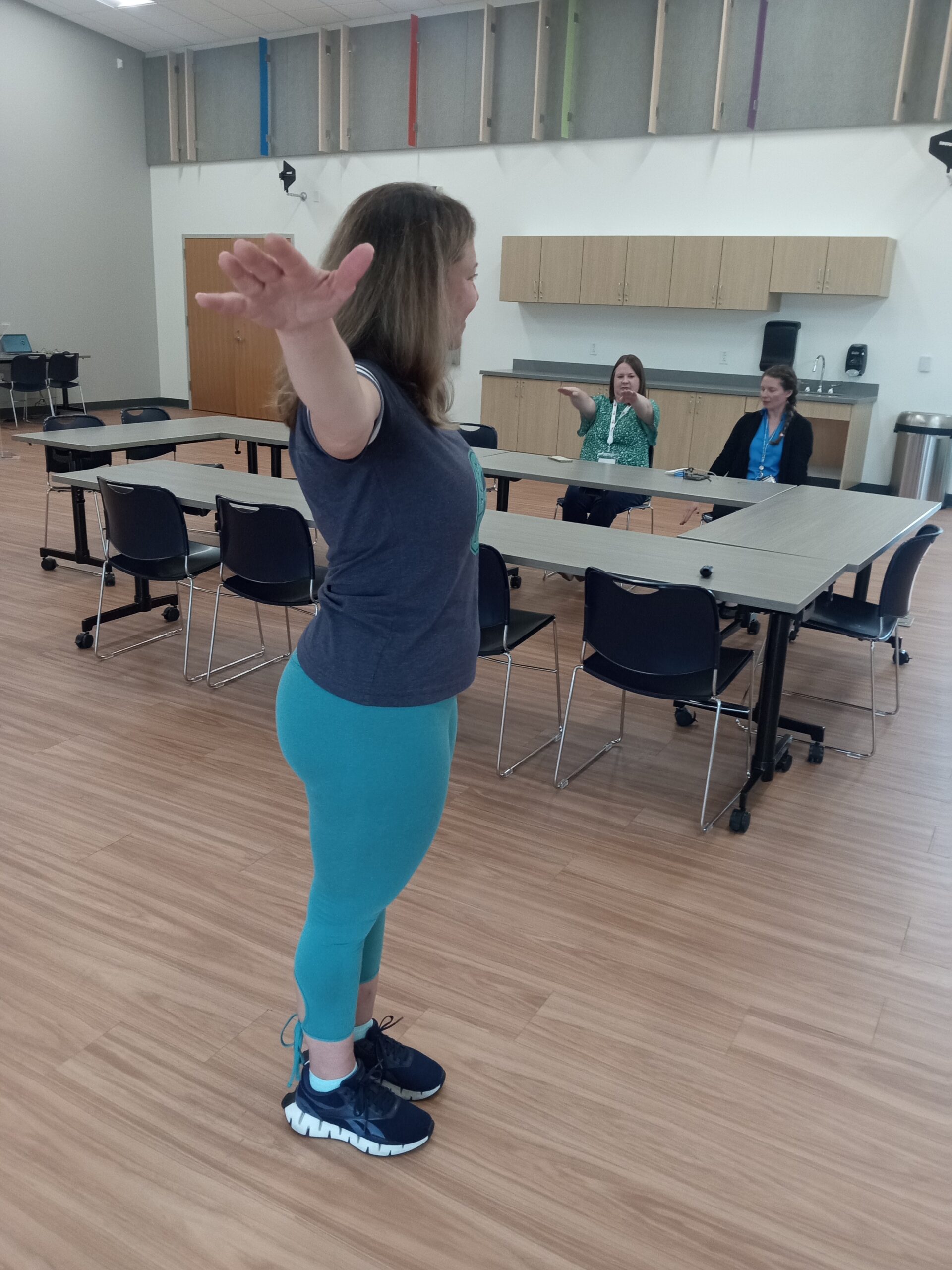 Teresa demonstrating a standing movement